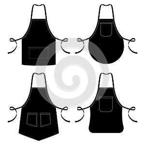 Black and white kitchen chef aprons isolated on white photo