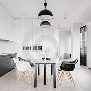 Black and white kitchen with table