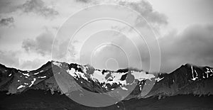 black and white landscape panorama of Patagonian mountains, taken from the beagle channel . Ushuaia, Argentina