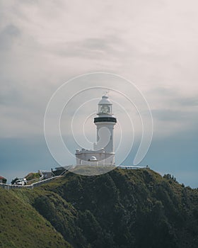 Black and white lighthouse atop a hill by the Byron bay