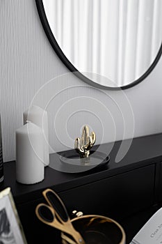 Black and white luxury feel dressing table corner in modern scandinavian style with gold circular lamp decorated / interior design