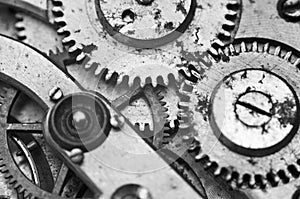 Black and white macro photo close-up view of metal clockwork