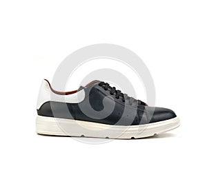Black and white male athletic shoes on a white background isolate side view
