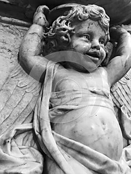 A black and white marble cherubim photo