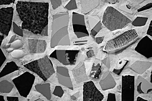 Black and white mosaic texture with various shapes