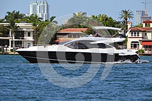 Black and white motor yacht on the Florida Intra-Coastal Waterway
