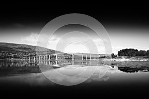 Black and white Norway bridge with reflection landscape