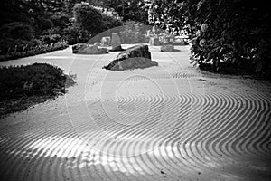 Black and white outdoor zen garden sand