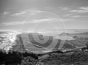 Black and white panorama of the mouth of the Imperial River in Puerto Saavedra. Chile. photo