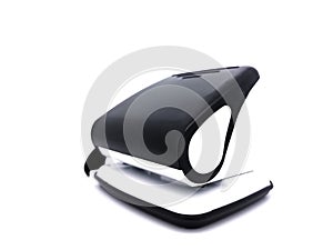 Black and white paper hole puncher, isolated on white background