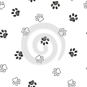 Black and white paw print repeated pattern