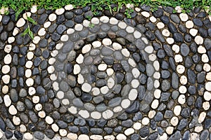Black and white pebbles mosaic floor