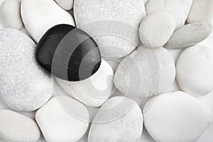Black and white pebbles stone texture. Spa therapy conceptual background