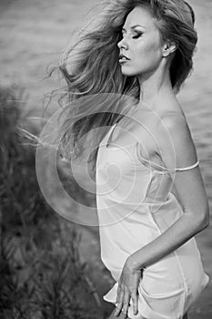 Black and white photo of beautiful blonde woman