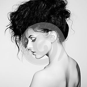 Black and white photo of beautiful woman with magnificent hair