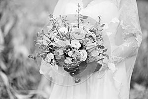 Black and white photo of a bride with a beautiful wedding