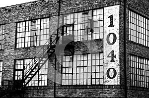 Black and white photo of a building with numbers