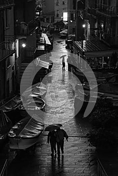 Black and white photo of the central square of Manarola after an evening rain