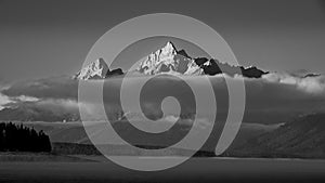 Black and White Photo of Clouds hanging over Jackson Lake in Grand Teton National Park