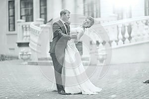 Black and white photo dancing bride and groom