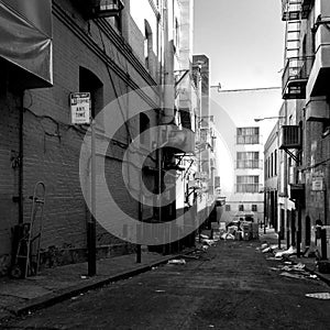 Black and white photo of a dead end street in San Francisco with a garbage