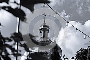 Black and white photo of the dome of the Orthodox Church. Cross.