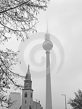 Black and white photo. Dramatic distinct view of famous TV Berlin tower .