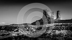 Black and White Photo of Eagle Mesa, a Sandstone Butte  in the desert landscape of Monument Valley