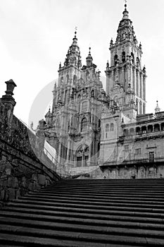 Black and white photo of the facade of the Cathedral of Saint James (Catedral de Santiago de Compostela) in Spain photo