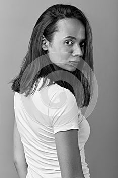 Black and white photo. girl has skin which develops pigment spots