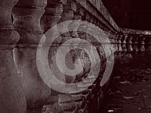 Black-and-white photo of a piece of balcony.