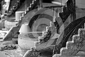 Black and white photo of a ceramic workshop