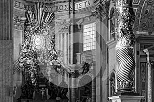 Black and white photo showing beautiful holy spirit altar and curved canopy pillar inside Saint Peter Basilica