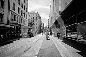 a black and white photo shows several people riding bicycles on a city street