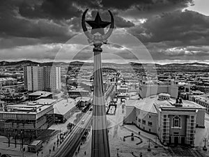 The black and white photo of the Soviet star on the top of the tower, and the aerial panorama in Ulan-Ude, Buryatia, Russia