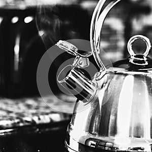 Black and White Steaming Tea Kettle