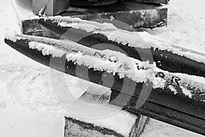 Black and white photo torpedoes in the snow with the inscription no war