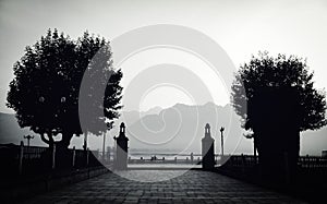 Black and white photo of trees and incredible mountains with beautiful morning view