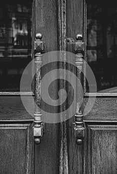 Details of classic architecture building entrance. Doorknob closeup