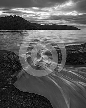 black and white photo of water and rocks at Ettalong on NSW Central Coast in Australia