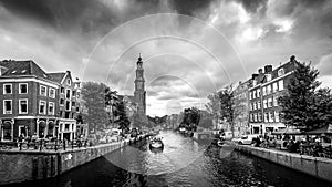 Black and White Photo of the Westertoren tower in the Jordaan neighborhood in Amsterdam photo