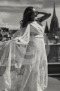 Black and white photo of young bride in white dress