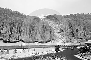 Black-and-white photographs of ski slopes and lifts in winter the snowy slopes of the mountains during a snowfall