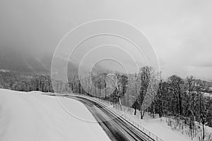 Black-and-white photographs of ski slopes and lifts in winter the snowy slopes of the mountains during a snowfall