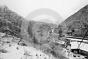 Black-and-white photographs of ski slopes and lifts in winter the snowy slopes of the mountains during a snowfall