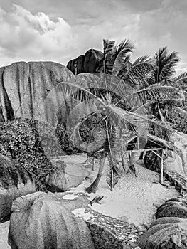 Black and White Photography of an Amazing tropical beach Anse Source d`Argent with granite boulders at sunset, La Digue Island,