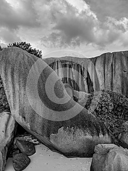 Black and White Photography of an Amazing tropical beach Anse Source d`Argent with granite boulders at sunset, La Digue Island,