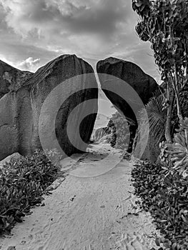 Black and White Photography of an Amazing tropical beach Anse Source d`Argent with granite boulders at sunset, La Digue Island,