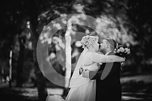 Black white photography beautiful young couple stand on background forest