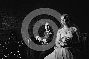 Black white photography beautiful young couple suit on a dark background